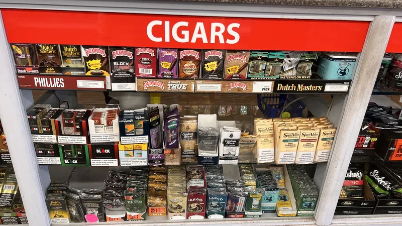 The Cigars shelf at GS Vape Barberton, stocked with a variety of cigar brands for Summit County customers. Cigars shelf display featuring Phillies, Dutch Masters and other brands at GS Vape Barberton