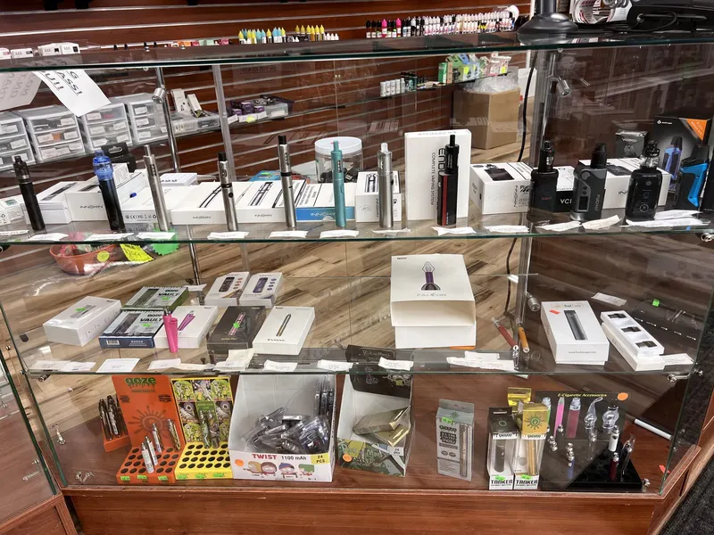 Wall of Elf Bar disposable vapes and e-liquid bottles at GS Vape in Barberton, Ohio