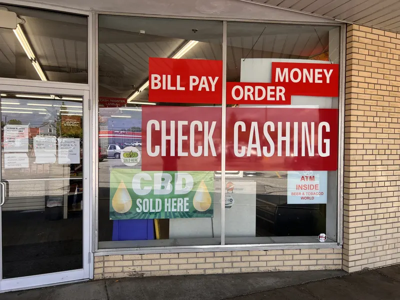 GS Vape Barberton storefront window decals for Bill Pay, Money Order, Check Cashing and CBD