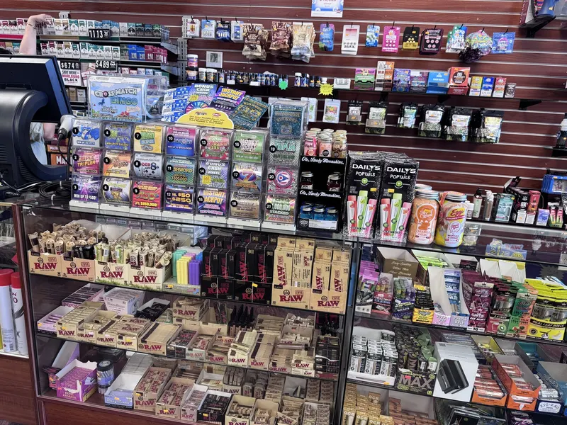 This counter at GS Vape Madison combines Ohio Lottery scratch-off tickets with RAW rolling papers and Daily's Poptails. It's one of the most-visited spots in the store for quick daily purchases. Ohio Lottery scratch-off tickets and rolling papers counter display at GS Vape in Madison, Ohio